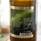 Herstellungs- und Qualitätshinweise auf der Seite der Aloe Vera Gold Trinkgel PLUS Flasche